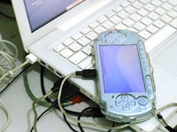 a psp connected to a laptop